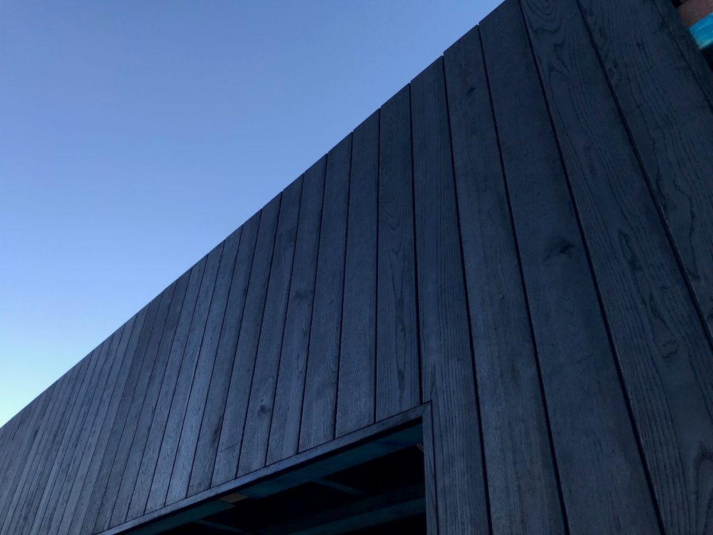 Shou Sugi Ban Timber Cladding with clear blue skies